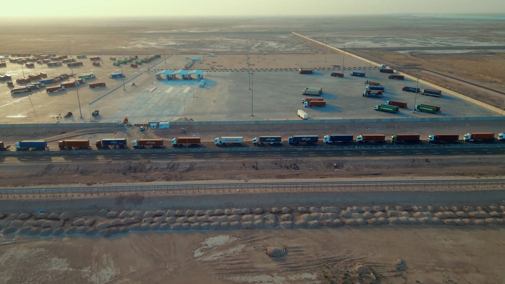 Container trucks on Road (Grand Welcome Yard)